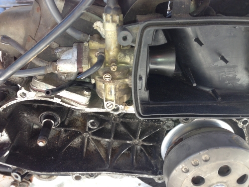 i wonder if these black hoses need to be attached to something? Might be time to invest in a spiffy aftermarket air filter. The dirty rag it came with just ain't that stylish...