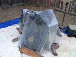 After pulling the engine I covered the scoot with plastic to keep out dust, pollen and critters.