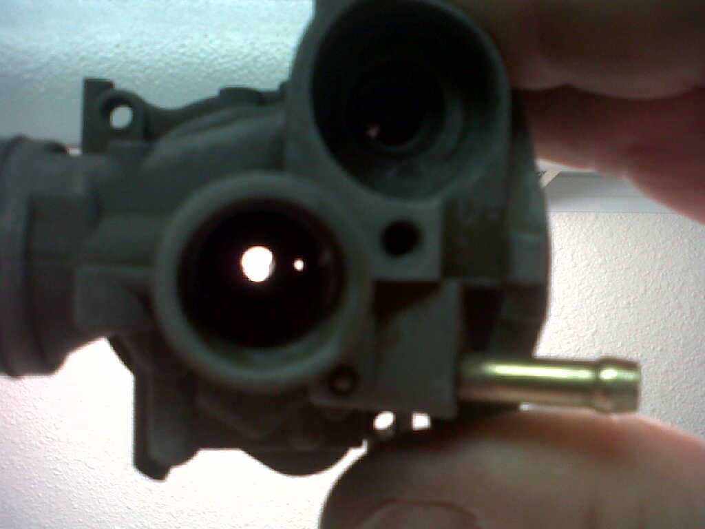 File showing small cast pilot circuit hole courtesy of Wheelman-111<br /><br />http://hondaspree.net/phpBB3/viewtopic.php?f=5&amp;t=21448