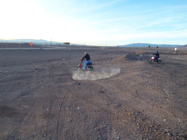 showing the kid how to do dounuts